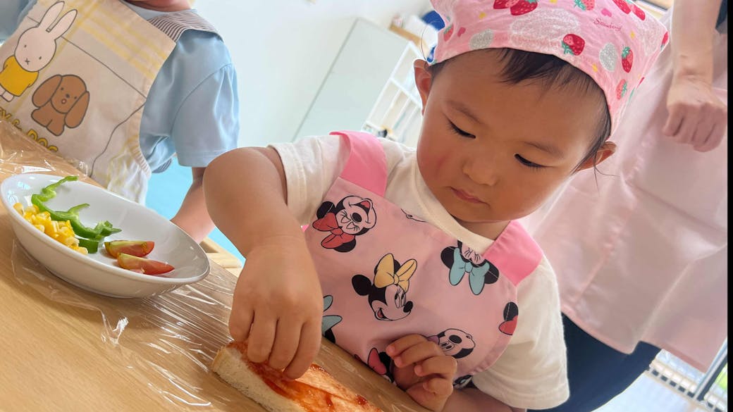 食育 　おやつのピザトーストを作ったよ。